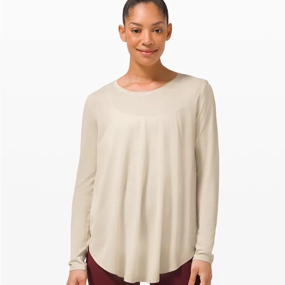 lululemon athletica Tops - Lululemon Cream/Off-White Bum-Covering Long Sleeve - Medium
